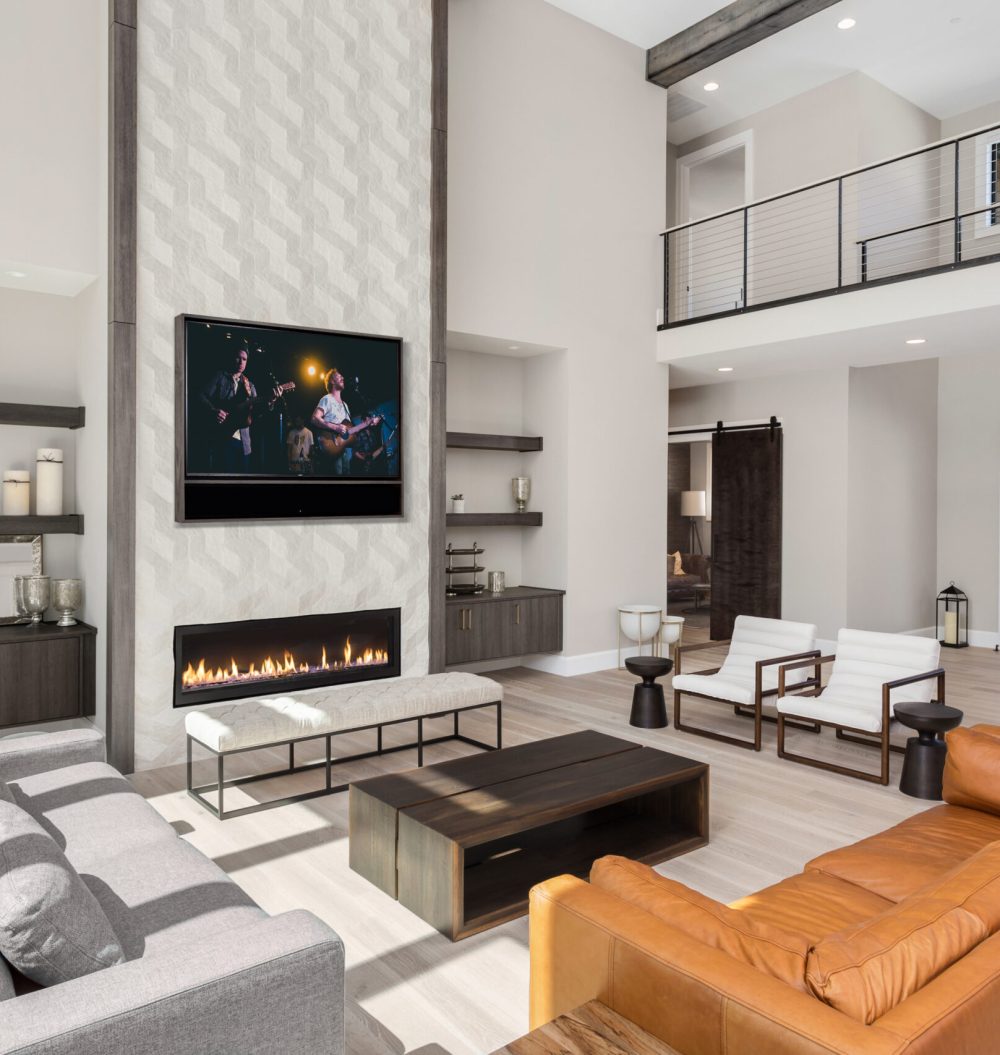 Beautiful living room interior in new luxury home. Features floo